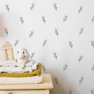 Small pink flower peel and stick wallpaper for a girls nursery bedroom decor. DIY, eco friendly