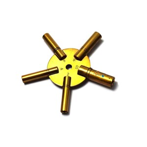 May include: A gold-colored watch key winding tool with five different sized prongs. The prongs are labeled with the numbers 2, 4, 6, 8, and 10.