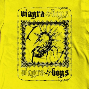 May include: Yellow t-shirt with a black graphic of a spider with spikes and the text "viagra boys" on a white background.