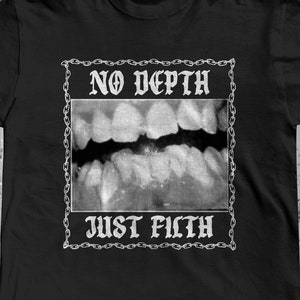 May include: Black t-shirt with a graphic of a mouth with teeth and the text "NO DEPTH JUST FILTH" in a chain-link border.