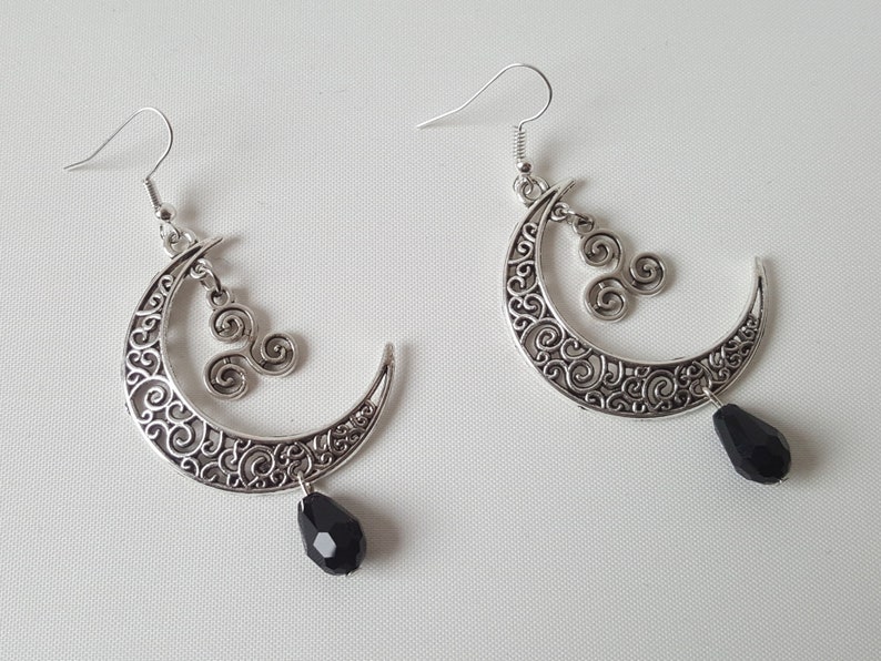 Sickle moon earrings with celtic triskele and faceted glass bead