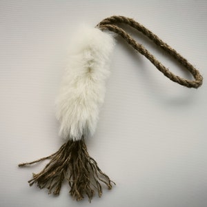 Natural sheepskin dog toy with organic linen rope