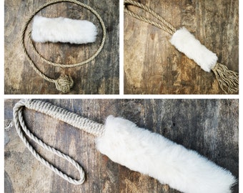 A set of 3 natural sheepskin dog toys with organic linen rope