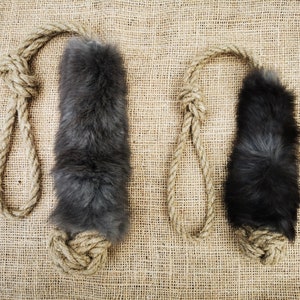 Natural rabbit fur and linen rope dog toy for tug-of-war and chasing games