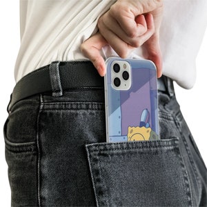 May include: A clear phone case with a cartoon image of SpongeBob SquarePants. The case is designed for an iPhone and features a purple and blue background. The case is shown in a back pocket of dark gray jeans. The phone case is a protective accessory for mobile devices.