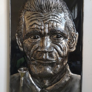 Chet Baker metal portrait. Wall bas-relief of the musician