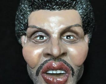 Collectible figure of Abel Tesfaye, The Weeknd plastic figurine with magnet. 4.3 /3.5 in.