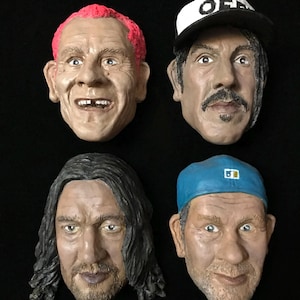 The Collectible magnet  figurines of of the classic Red Hot Chili Peppers lineup Anthony Kiedis, John Frusciante, Flea, Chad Smith