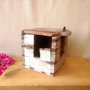 Old wooden box with an opening and a ring inside, Vintage wooden box, Wooden container.