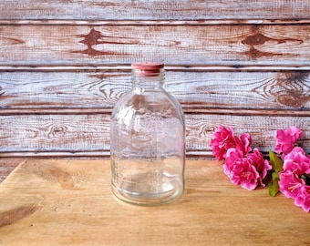 Botella medidora vintage de vidrio transparente: botella de 500 ml con relieve y tapón de goma