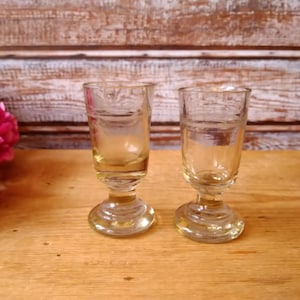 Very old set of two small pedestal glasses, Glass footed tumblers, Footed pedestal goblets, Alcohol gifts.