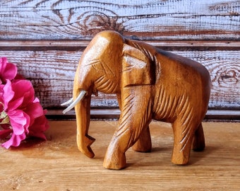 Vintage wooden hand carved elephant with tusks, Small elephant figurine, Good luck gift.