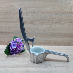 Vintage aluminum hand held fruit juicer, Juice squeezer, Hand held juicer press.