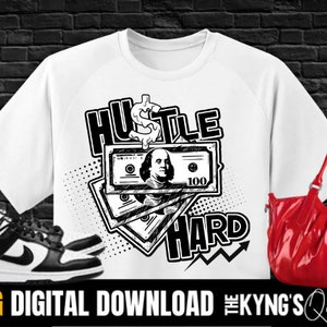 May include: Black and white graphic design on a white t-shirt featuring a stack of money with the words "Hustle Hard" and a dollar sign.