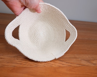 Small Casserole Style cotton rope dish, 7 inches wide x 2.5 inches tall x 8 inches long. Soft organizing basket, great housewarming gift