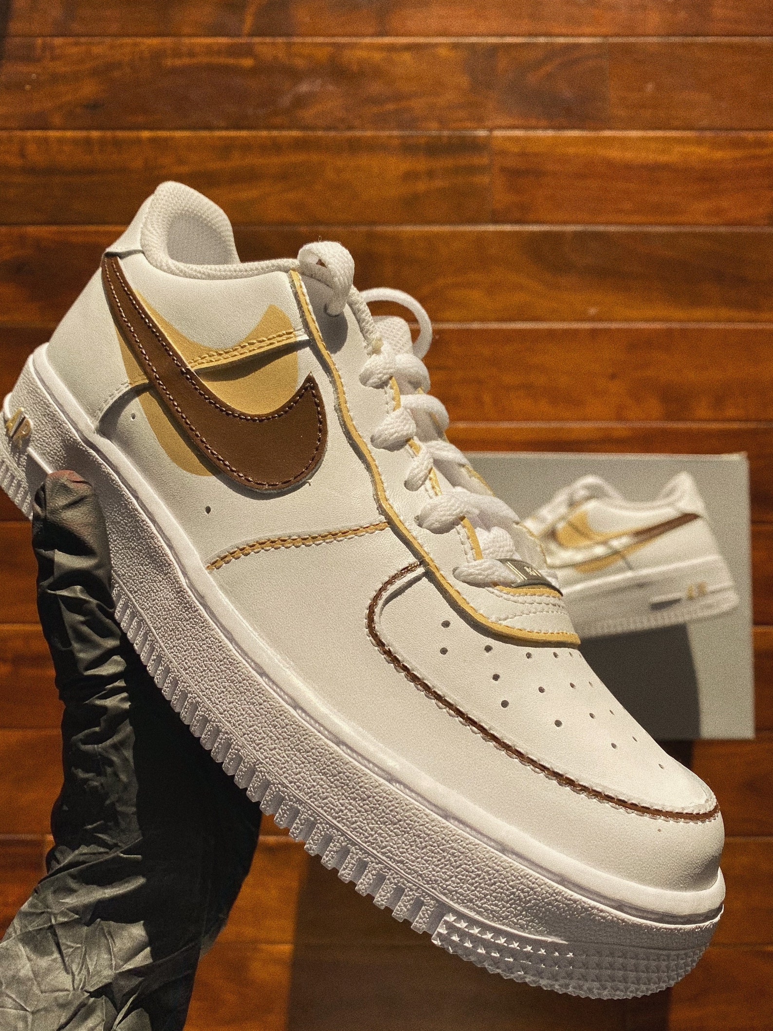 brown swoosh af1