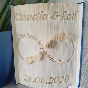 Book folding art infinity symbol wedding