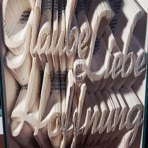 Book folding art *Faith Love Hope*