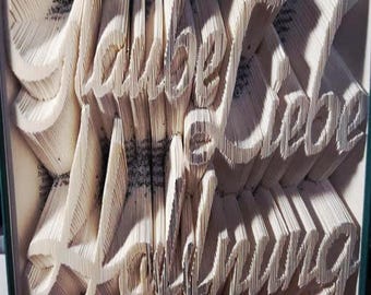 Book folding art *Faith Love Hope*