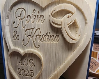 Buchfaltkunst Hochzeitsbuch Eheringe raus