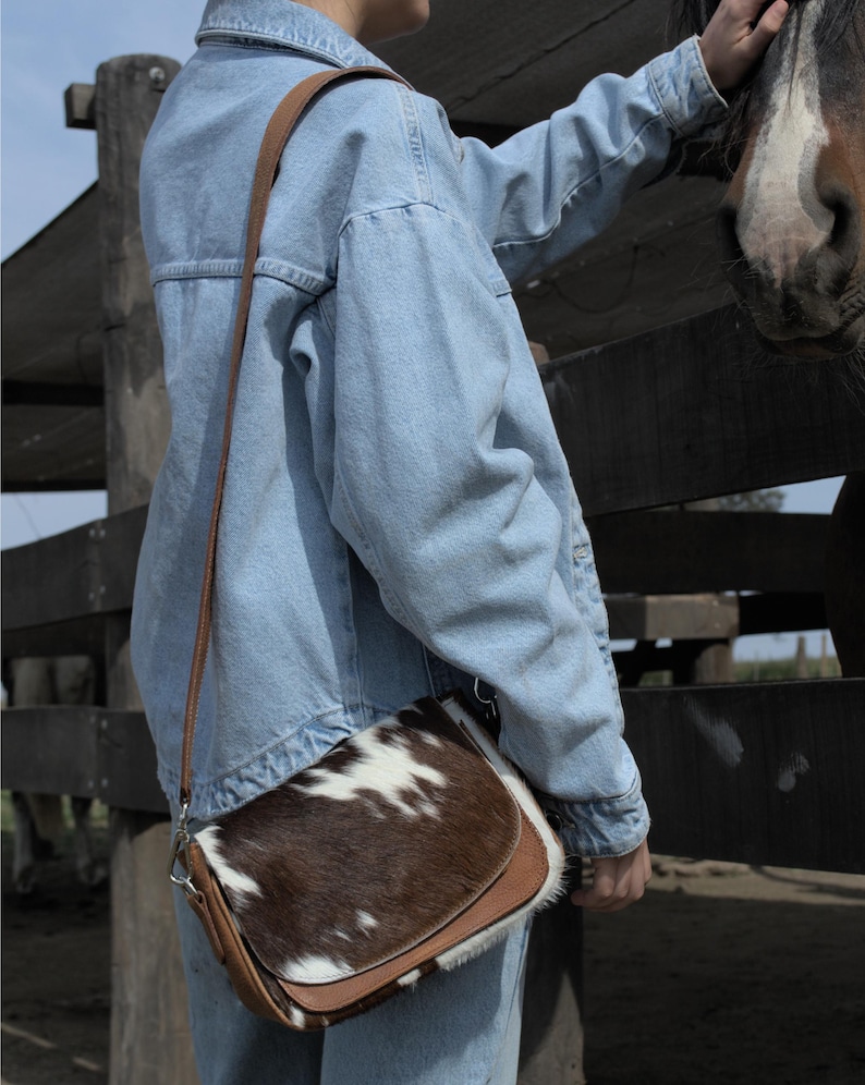 Elevate your style with rustic elegance. This handcrafted Argentine leather bag is the perfect unique accent.