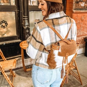 Chic Cowhide Backpack with Tassels - Handcrafted Bohemian Leather Bag for Women