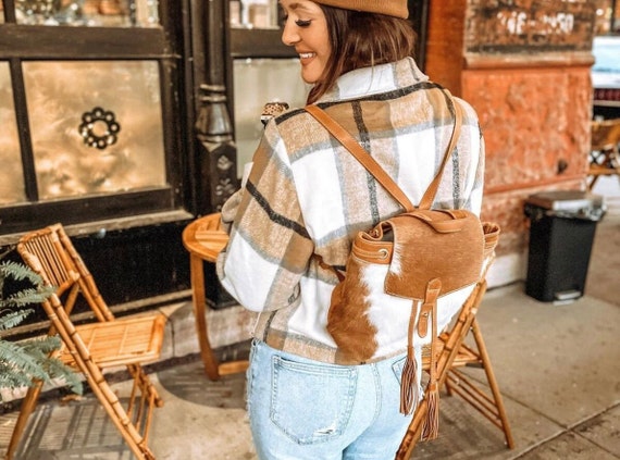Chic Cowhide Backpack with Tassels - Handcrafted Bohemian Leather Bag for Women