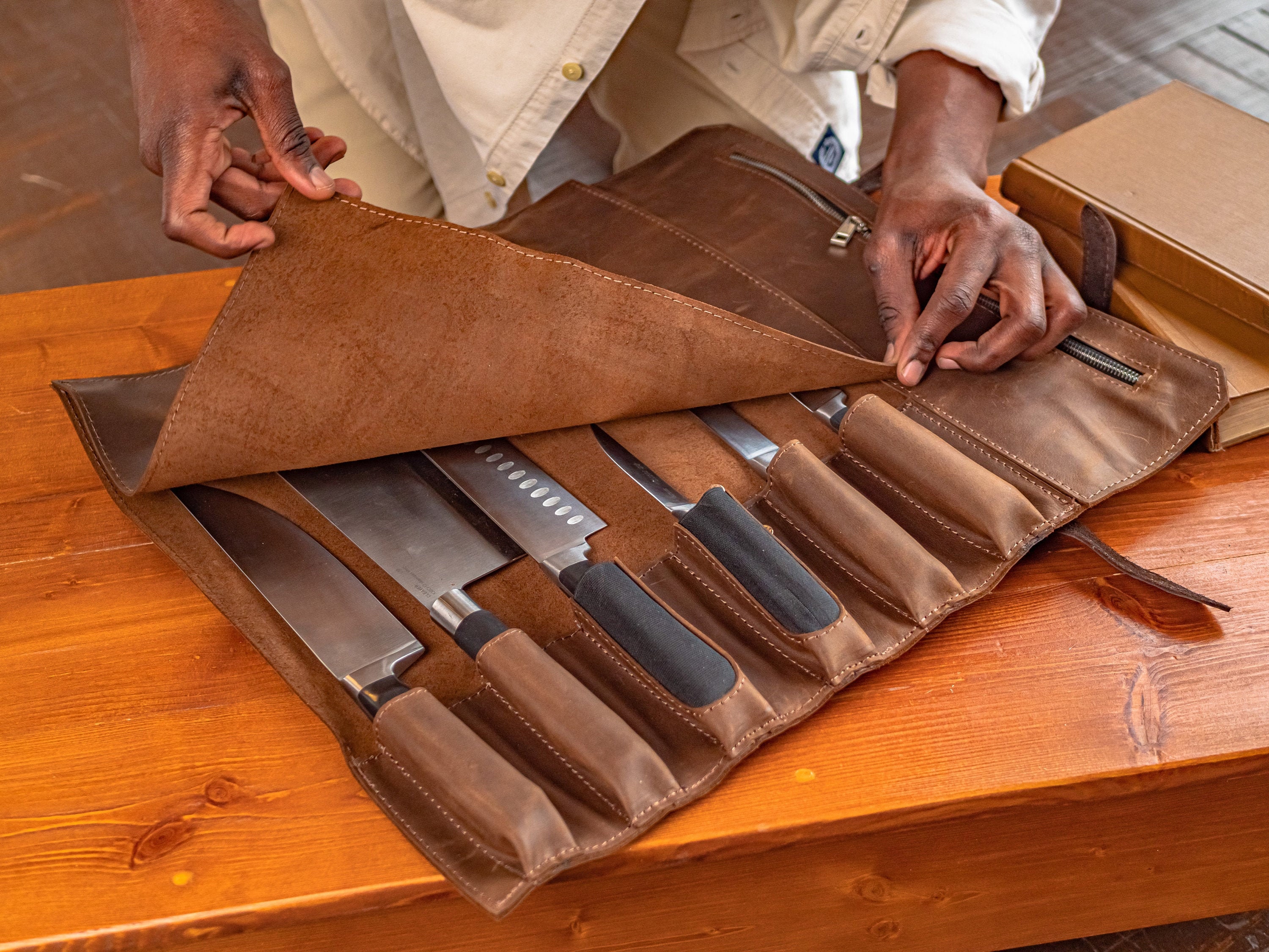 Fancy kitchen knife set with leather roll bag