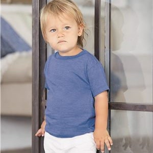 May include: A toddler wearing a light blue short-sleeved t-shirt with a distressed look. The t-shirt is made of a soft, comfortable fabric.