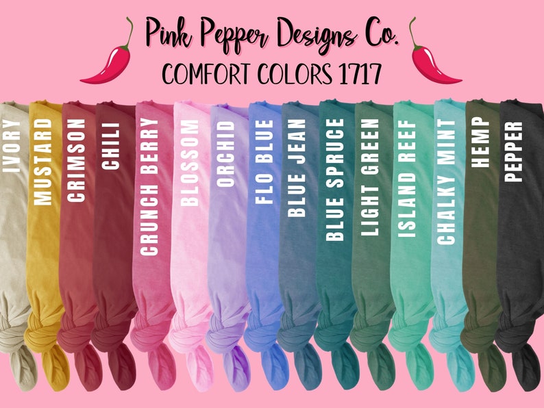 May include: A collection of 15 fabric swatches in various colors, including ivory, mustard, crimson, chili, crunch berry, blossom, orchid, flo blue, blue jean, blue spruce, light green, island reef, chalky mint, hemp, and pepper. The swatches are arranged in a row and tied in a knot at the bottom. The text "COMFORT COLORS 1717" and "Pink Pepper Designs Co." is displayed above the swatches.