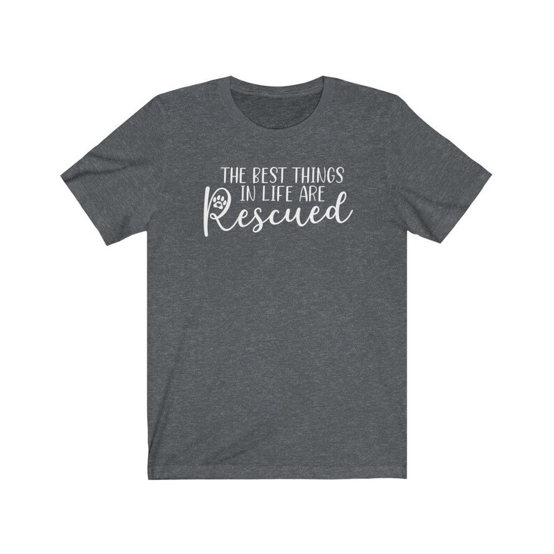 May include: A dark heather grey t-shirt with the text "The best things in life are Rescued" in white lettering with a paw print icon.
