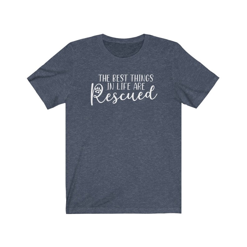 May include: A dark blue t-shirt with the text "The best things in life are Rescued" in white lettering with a paw print icon.