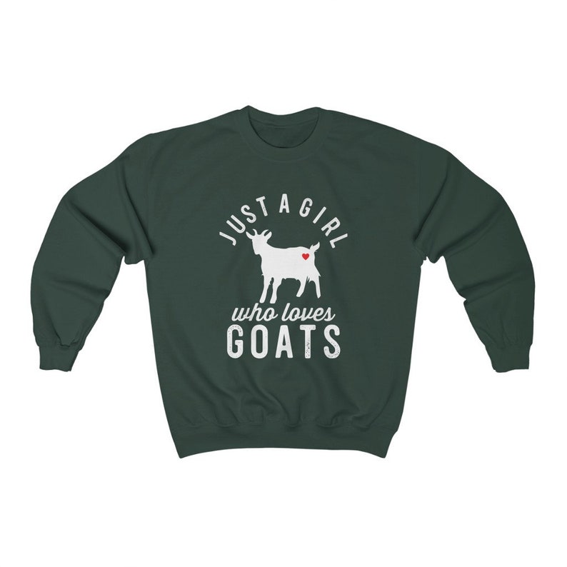 May include: A dark green sweatshirt with a white graphic of a goat with a red heart on its side. The text "Just a girl who loves goats" is printed below the goat.