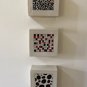 Whimsical Hand Built Stoneware Canvases, Each One Is Painted With A Graphic Design, Three Graphic Designs