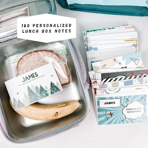 May include: A set of 180 personalized lunch box notes featuring various colorful graphic designs and motivational text. One note reads 'JAMES You are strong, brave, and kind!' with a forest illustration, while another says 'JAMES KINDNESS IS A SUPERPOWER'.