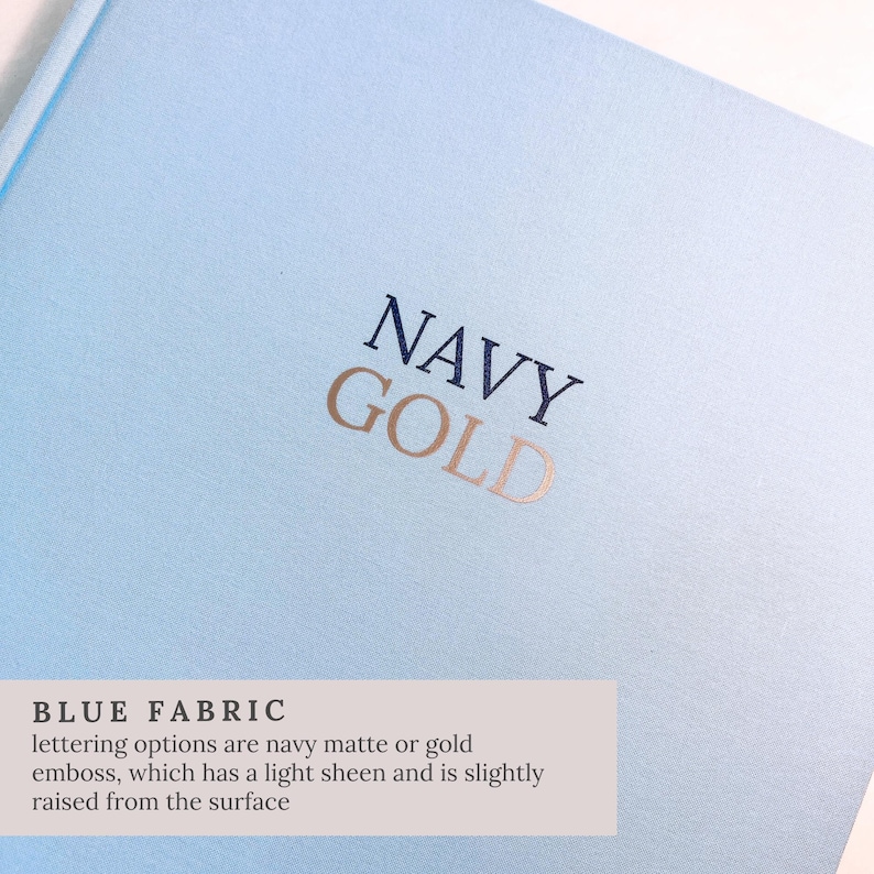 May include: A light blue fabric with the words "NAVY GOLD" embossed in navy and gold. The text is slightly raised from the surface. The bottom of the image has text that reads "BLUE FABRIC".