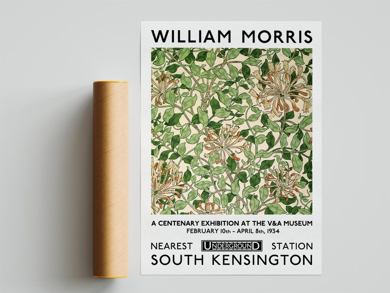 May include: A black and white poster advertising a William Morris exhibition at the Victoria and Albert Museum in London, England. The poster features a floral pattern and the text "WILLIAM MORRIS", "A CENTENARY EXHIBITION AT THE V&A MUSEUM", "FEBRUARY 10th - APRIL 8th, 1934", "NEAREST UNDERGROUND STATION", and "SOUTH KENSINGTON".