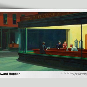 May include: A painting by Edward Hopper titled "Nighthawks" depicting a diner at night with four people sitting at the counter. The diner is lit by bright yellow lights, and the exterior is dark green. The painting is from the Whitney Museum of American Art in New York City.