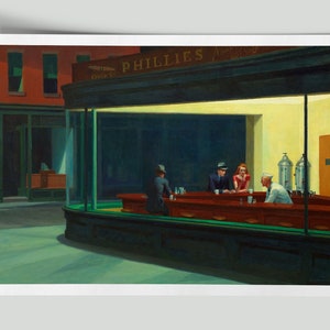 May include: A print of Edward Hopper's "Nighthawks" painting. The scene depicts a diner at night with three patrons and a server behind the counter. The diner is brightly lit, contrasting with the dark street outside.