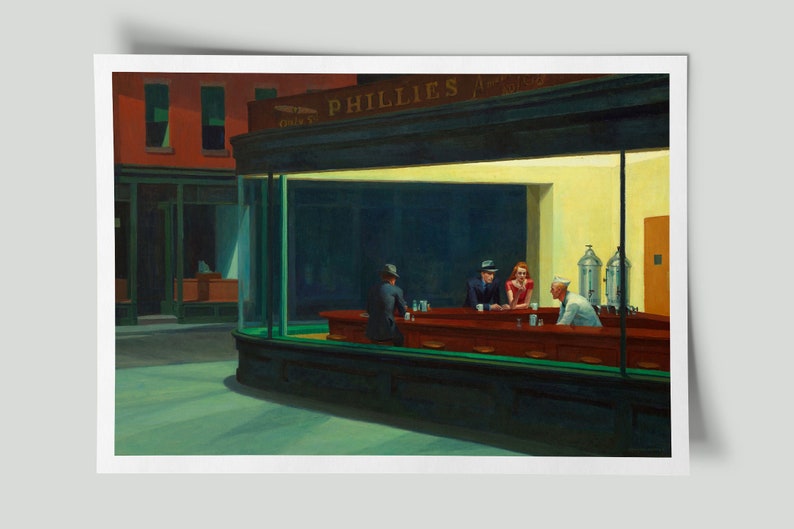 May include: A print of Edward Hopper's "Nighthawks" painting. The scene depicts a diner at night with three patrons and a server behind the counter. The diner is brightly lit, contrasting with the dark street outside.