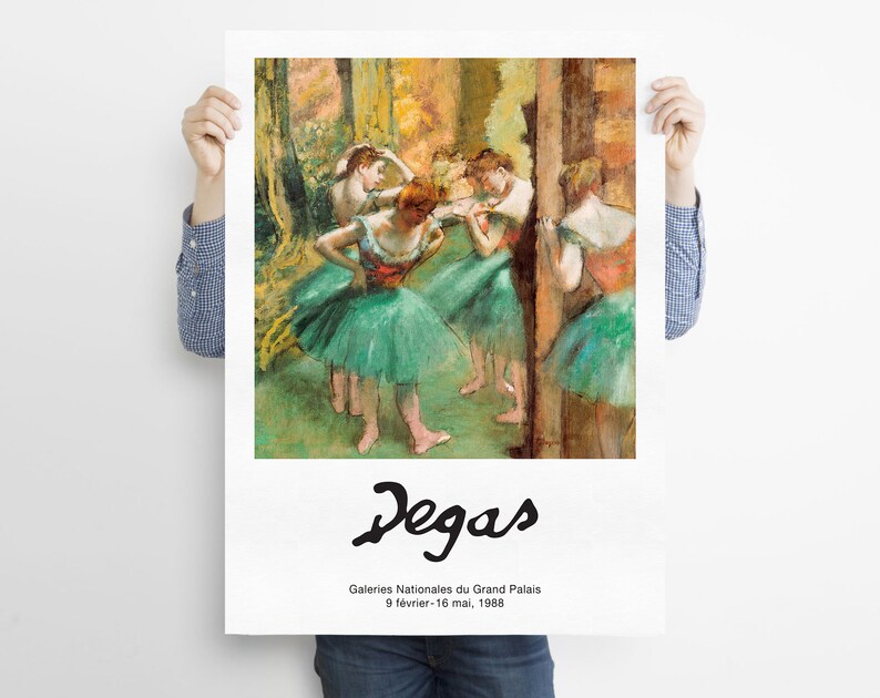 May include: A painting by Edgar Degas depicting a group of dancers in green tutus. The dancers are in a studio setting, with a wooden barre in the background. The painting is titled "Degas" and includes the text "Galeries Nationales du Grand Palais 9 fevrier - 16 mai, 1988."