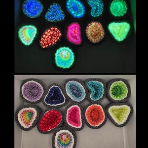 May include: A collection of eleven crocheted geode-shaped ornaments with dark gray borders and colorful beaded centers. The top half shows the items glowing in various neon colors in the dark, while the bottom half shows them in daylight.