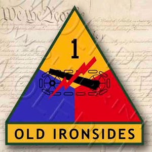 May include: A yellow, blue, and red triangular patch with a green border. The patch has a cannon and lightning bolt design with the number "1" in the center. The text "OLD IRONSIDES" is printed on the bottom.