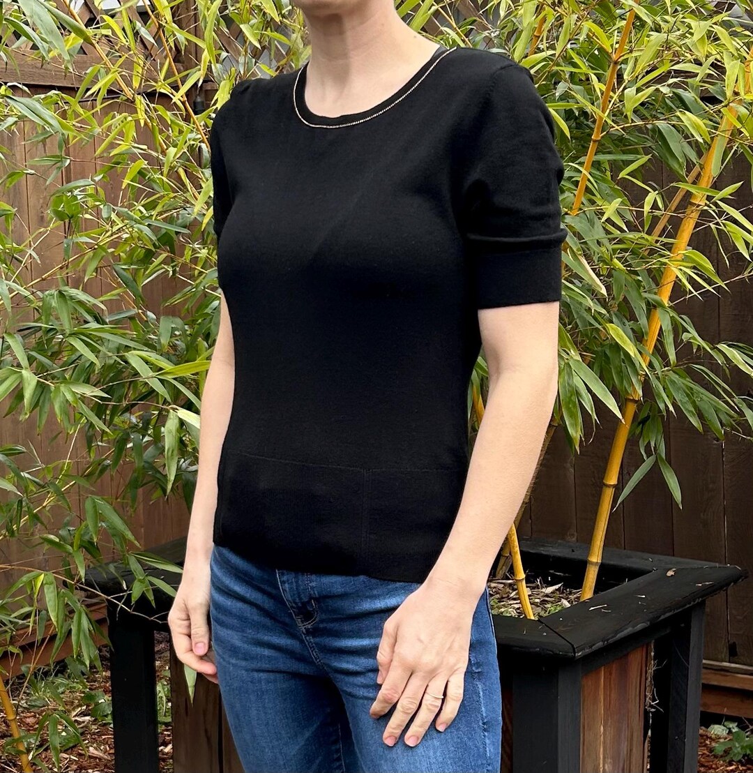 Black knit cropped top with gold buttons