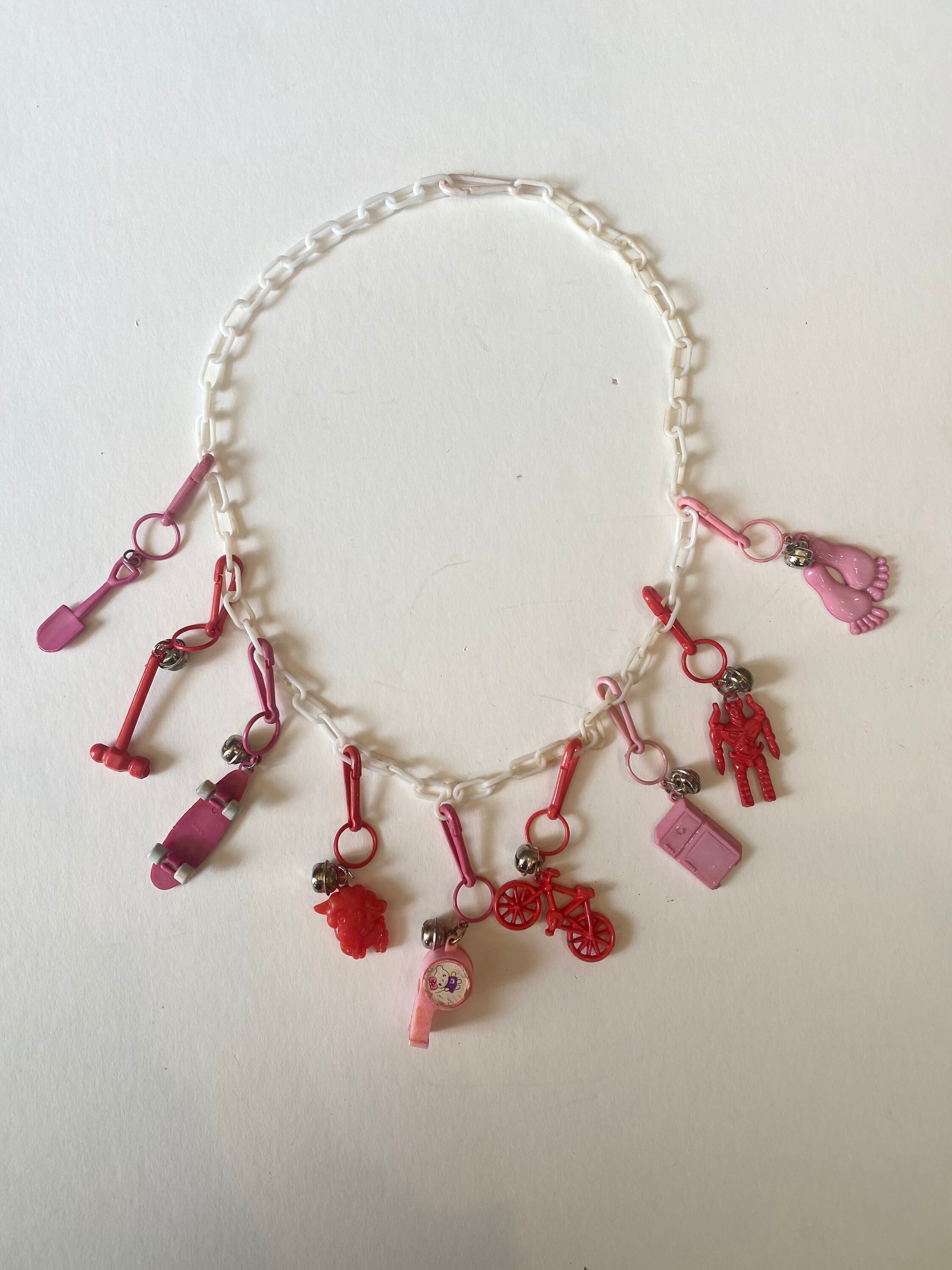 Vintage 1980s Plastic Clip On Bell Charm Necklace With 44 Charms - $107 -  From Annette