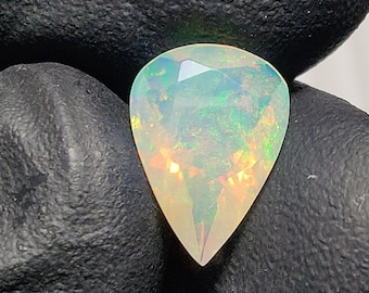 Natural Ethiopian Opal, Faceted Pear Cut Gemstone, Multi-color Fire (1.50ct, 11.60x8.40mm)