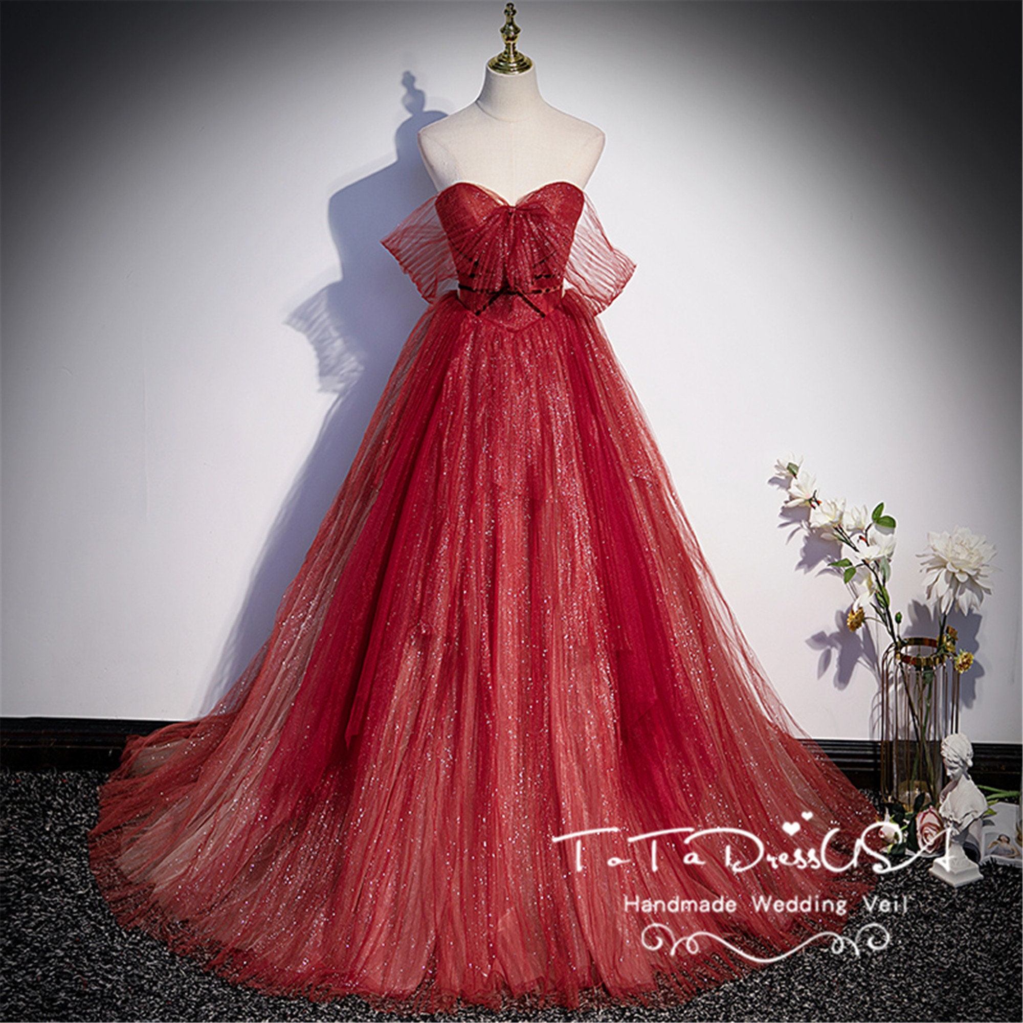 Female Graduates In Red Gown And White Streamers Custom Graduation