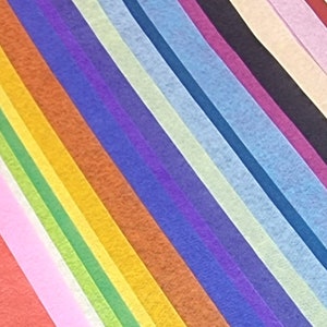 May include: A collection of tissue paper in various colors, including red, orange, yellow, green, blue, purple, pink, and white. The tissue paper is arranged in a diagonal pattern.