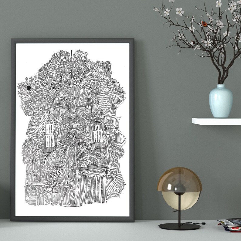 May include: Black and white line art print of a city skyline. The print is framed and hanging on a gray wall.