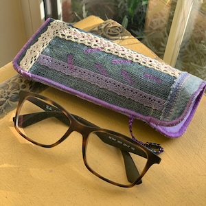 Handmade denim glasses case hand embroidered and embellished with lace